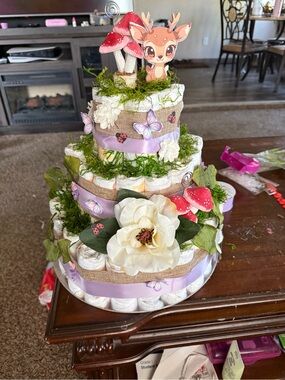 Woodland Baby Shower Diaper Cake with Purple Ribbon and Floral Accents